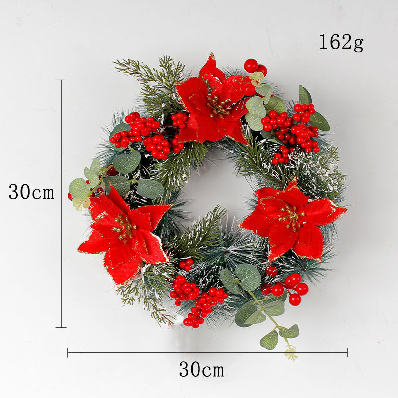 Christmas wreath, 30cm diameter, weighing 162g, adorned with red poinsettias, berries, and green leaves on a snowy pine base, creating a festive decoration.