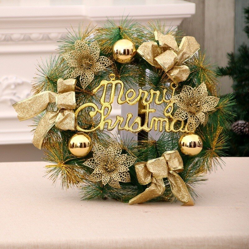 Christmas wreath with gold bows, shimmering flowers, and ornaments, featuring "Merry Christmas" in gold lettering. It hangs on a neutral background, evoking festive cheer.