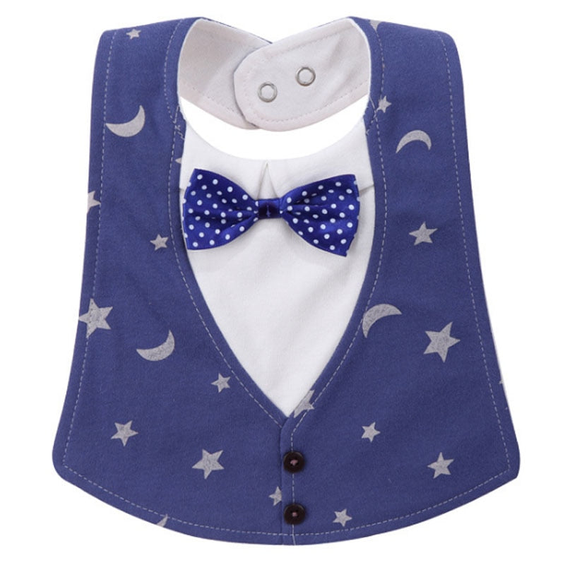 Baby bib designed like a vest, featuring a blue star and moon pattern. It includes a white background with a blue polka dot bow tie and two button accents.