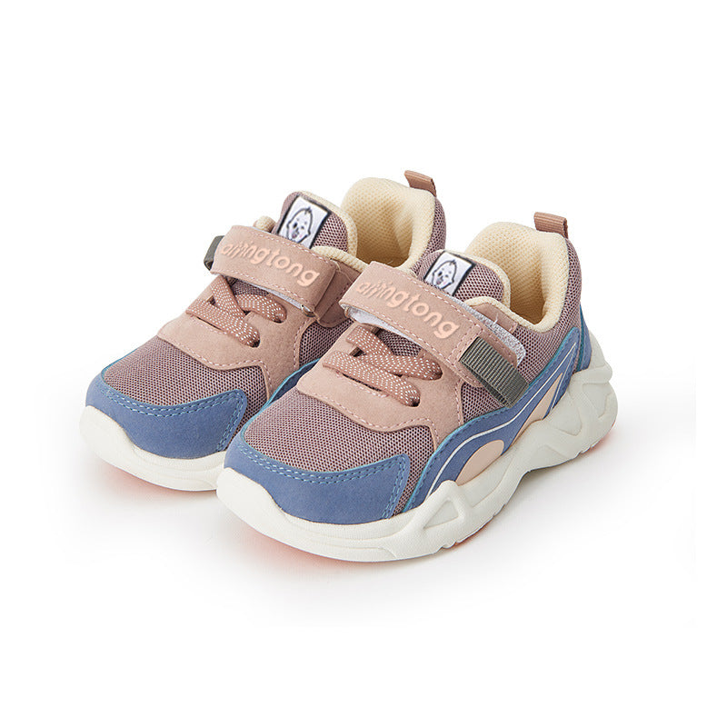 Children's sneakers with beige, pink, and blue hues. They feature Velcro straps, a cushioned sole, and a playful design, ideal for comfort and style in kids' footwear.