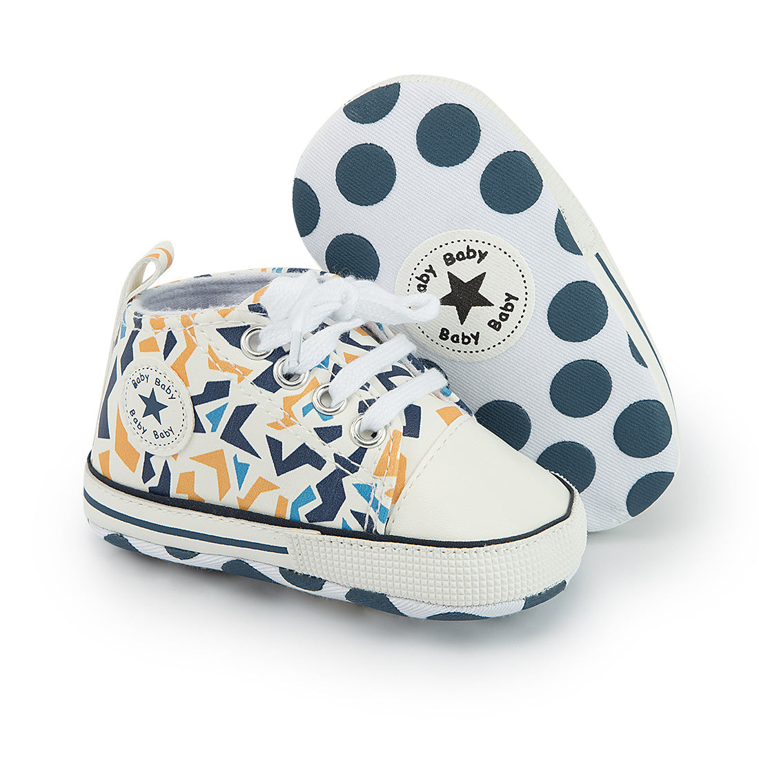 Colorful baby sneakers with star patterns and white laces. One shoe is upright, and the other is tilted, showing blue polka dots on the sole and a "Baby Baby" print.