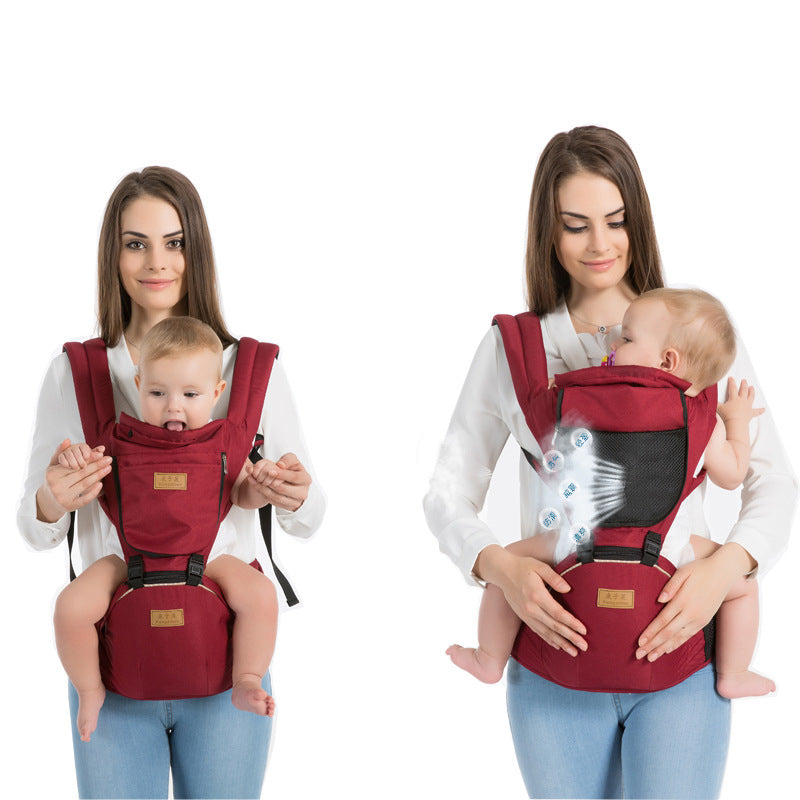 A woman demonstrates a red baby carrier in two positions: facing forward and toward her. The carrier features mesh ventilation for comfort. She wears casual attire and smiles gently.