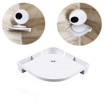 White corner wall shelf with a circular design, shown attached to a tiled wall. The shelf is compact, sturdy, and designed to save space, ideal for organizing small items.