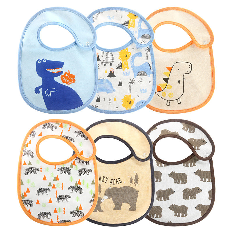 Six colorful baby bibs with animal designs, including dinosaurs, bears, and trees. Each bib has a snap closure and distinct patterns in shades of blue, orange, and brown.