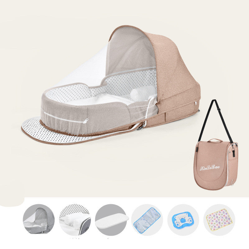 Portable baby bassinet with a brown canopy, white mesh, and polka dot lining. Includes carry case and accessories like a mattress, changing pad, and colorful baby pillow.