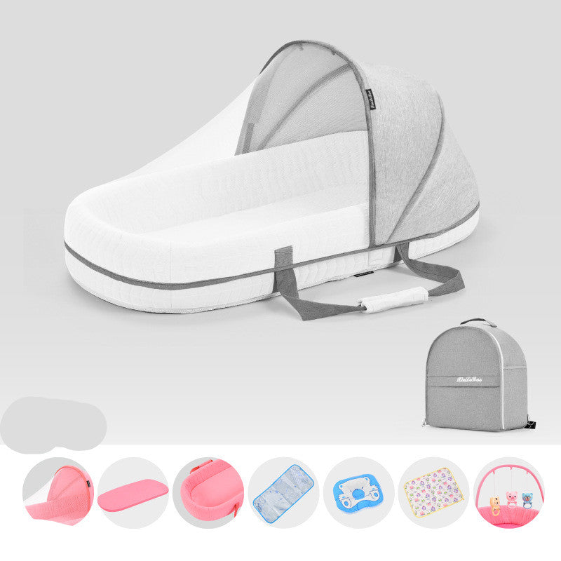 Portable baby bassinet with a gray canopy and straps, accompanied by a matching backpack. Icons below show pink mat, side view, blue pad, and cushion.