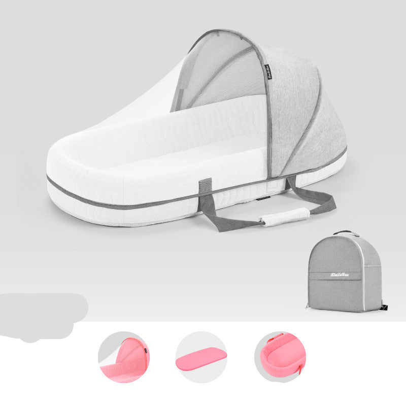 Portable baby bassinet with a gray canopy, removable mattress, and foldable design. Includes a matching gray carrying backpack for easy transport and storage.