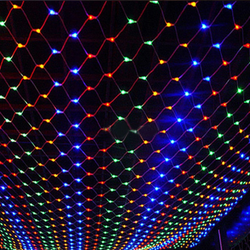 Colorful LED net lights in a grid pattern stretched across a dark background, featuring vivid red, green, and blue hues creating a vibrant and festive atmosphere.