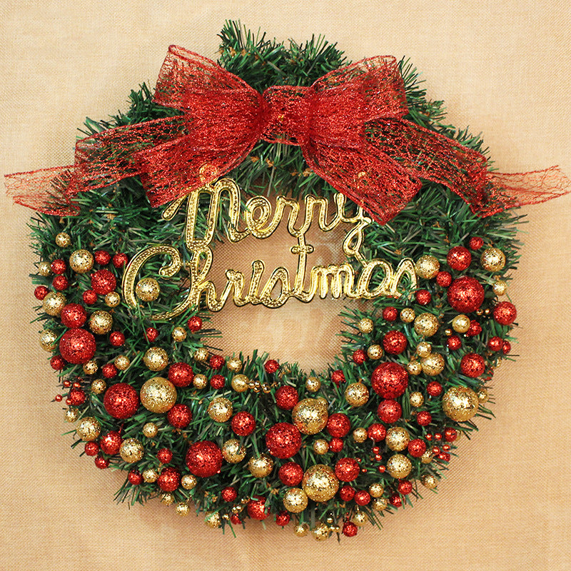 Festive Christmas wreath adorned with red and gold baubles, and a large red bow on top. "Merry Christmas" is displayed in glittering gold text at the center.