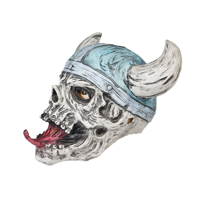 A skull mask with a blue Viking helmet and horns, featuring an exaggerated open mouth with a long red tongue. The texture is aged and detailed, giving a spooky appearance.