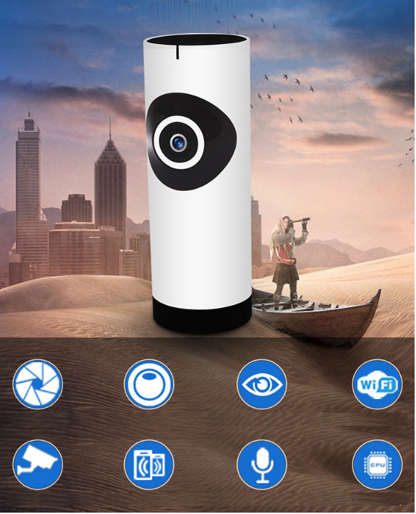 A cylindrical device with a camera lens stands on a sandy desert with a city skyline in the background. Icons below depict lens, eye, Wi-Fi, surveillance, battery, mic, and CPU.