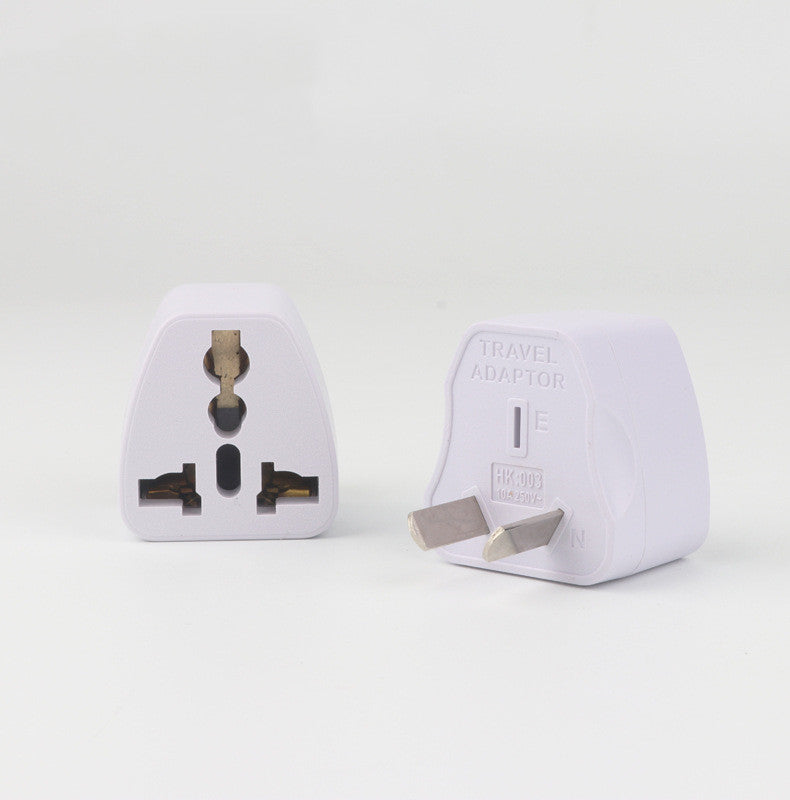 Two white travel power adapters, one showing the outlet slots and the other displaying the prongs. Both are labeled with "HK-003" and "Travel Adapter" text.