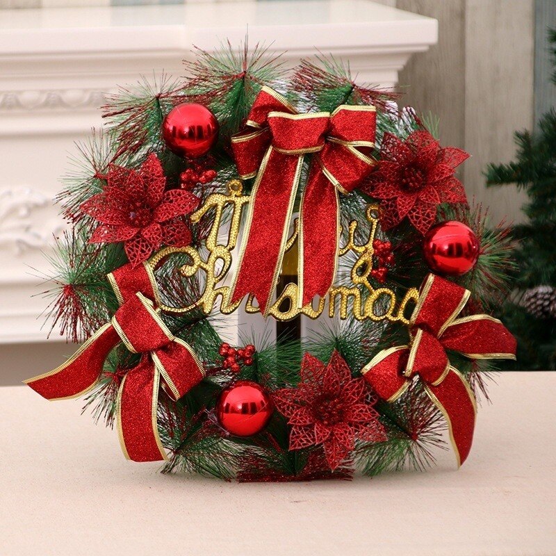 Festive Christmas wreath with red bows, shiny baubles, poinsettias, and golden "Merry Christmas" lettering, set against a soft beige background.