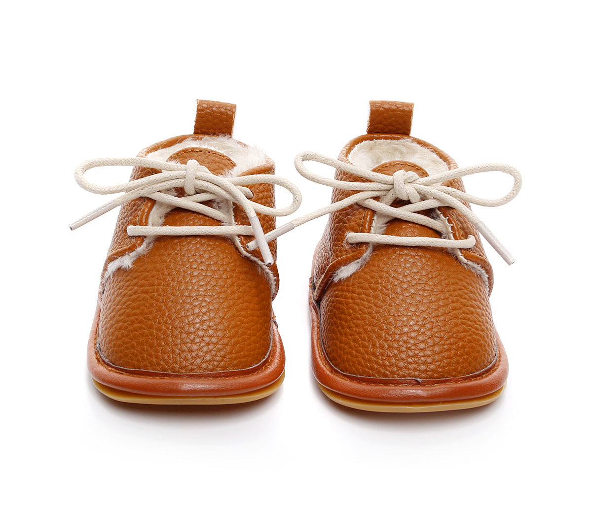 Brown baby shoes with white laces and fur lining, made of textured leather. They are displayed upright on a white background, highlighting their sturdy design and soft interior.