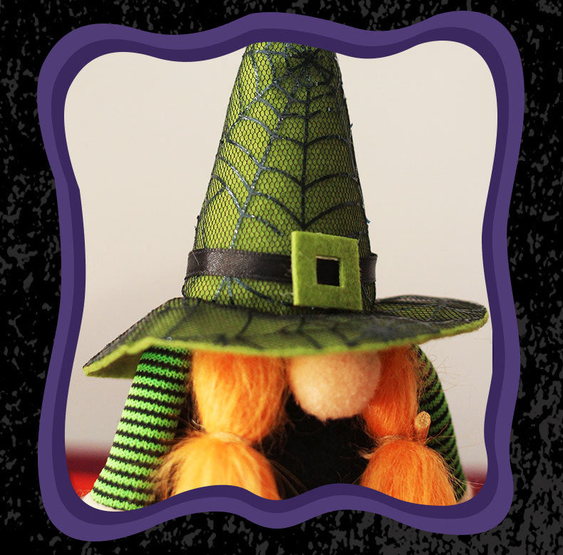 A whimsical gnome with long orange braids wearing a pointy green hat decorated with black spiderweb patterns and a belt buckle. The background is framed with a wavy purple border on a textured black backdrop. The gnome's face is partially hidden under the hat's brim.