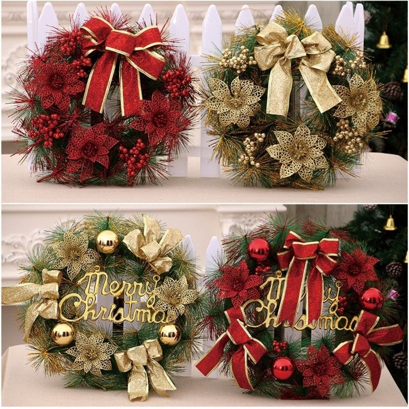 Four festive Christmas wreaths with red and gold accents, featuring bows, poinsettias, berries, and ornaments, displayed against a white fence background.
