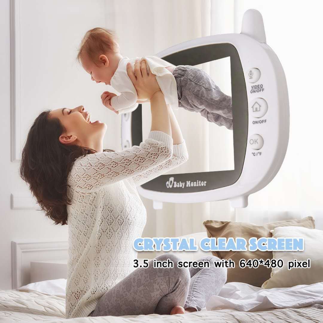 A mother joyfully lifts her baby, with a large baby monitor frame around them. Text reads "CRYSTAL CLEAR SCREEN, 3.5 inch screen with 640*480 pixel."