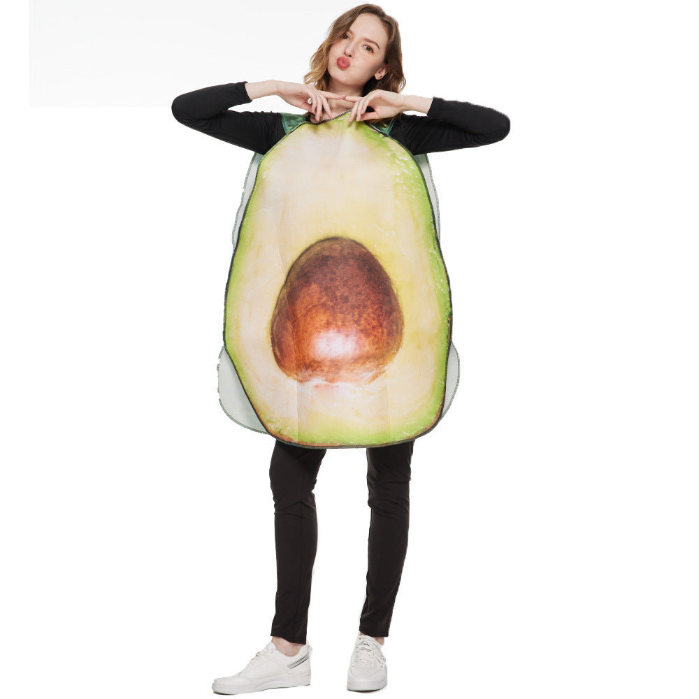 A person posing playfully in an avocado costume, featuring a large pit design, set against a plain white background.
