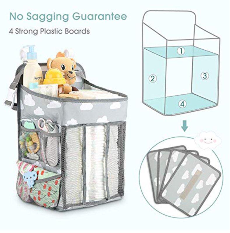 Gray diaper caddy organizer with cloud pattern, featuring mesh pockets with baby supplies. Includes an inset diagram showing four strong plastic boards for structure.