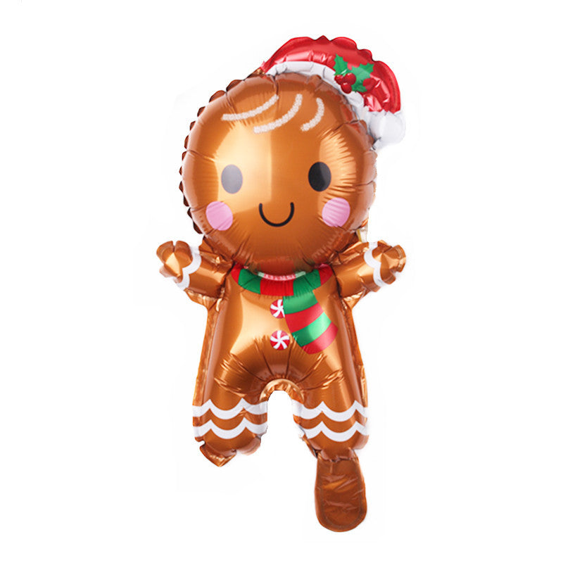 Shiny gingerbread man balloon with a Santa hat and festive scarf, featuring rosy cheeks and a smiling face, decorated with white icing details and peppermint buttons.