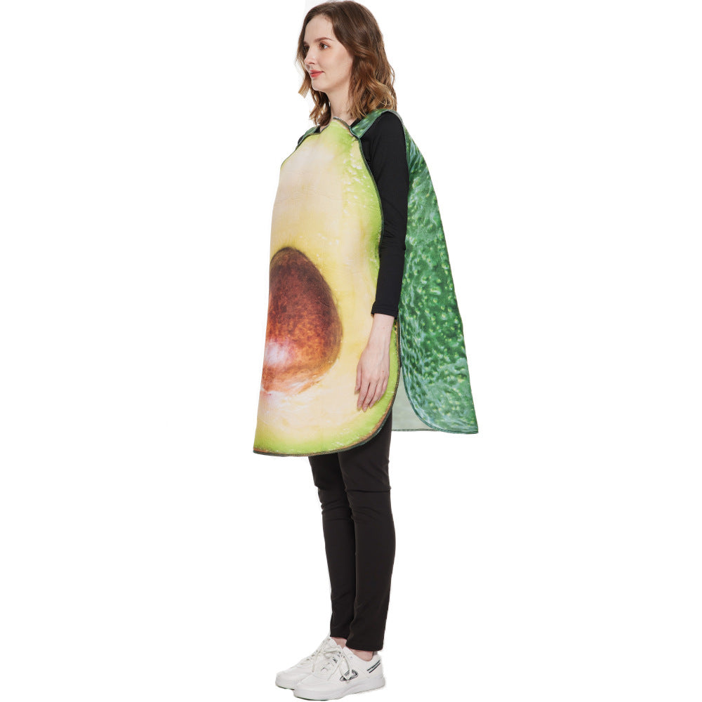 Person wearing an avocado costume, showing a cut avocado with a seed on their front. They have long hair and are dressed in black pants and white sneakers, posing sideways.