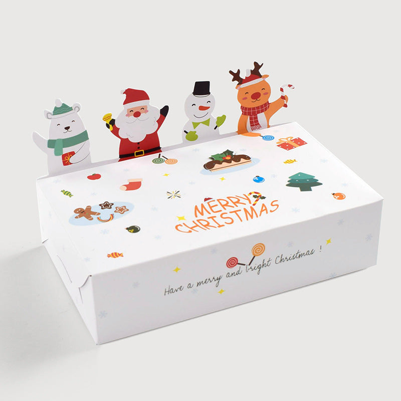 A festive Christmas gift box featuring illustrations of a bear, Santa, snowman, and reindeer. The box is decorated with holiday-themed icons and reads "Merry Christmas."