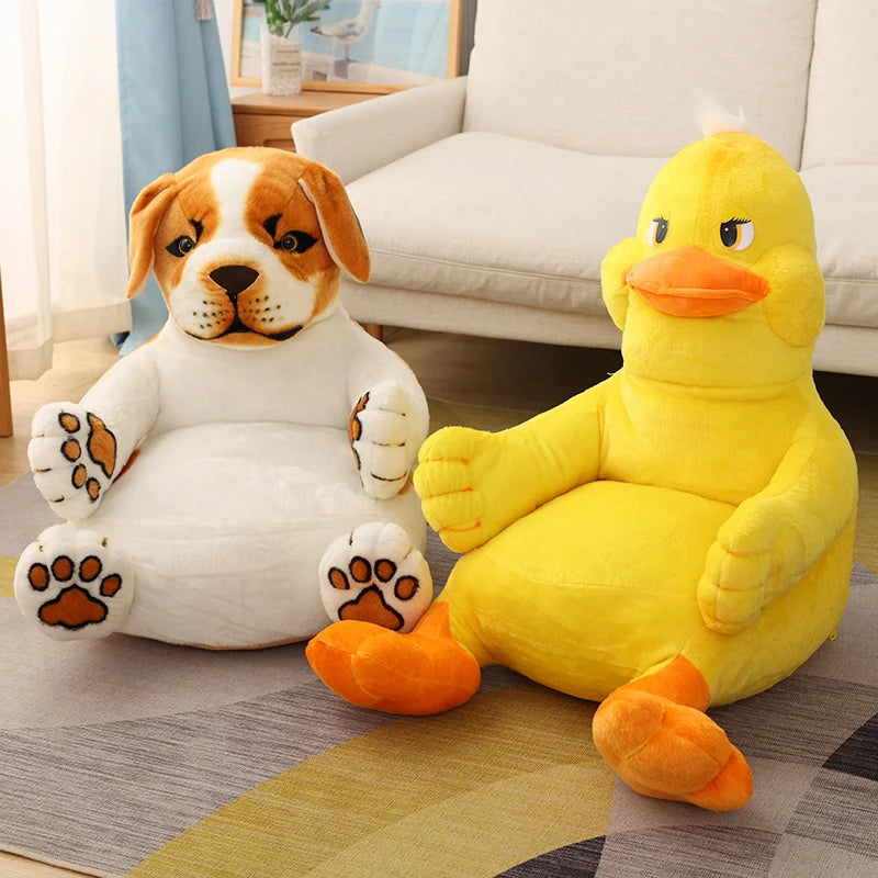 Two plush chairs designed as animals sit on a rug. One resembles a white and brown puppy, while the other resembles a yellow duck with orange feet and a beak.