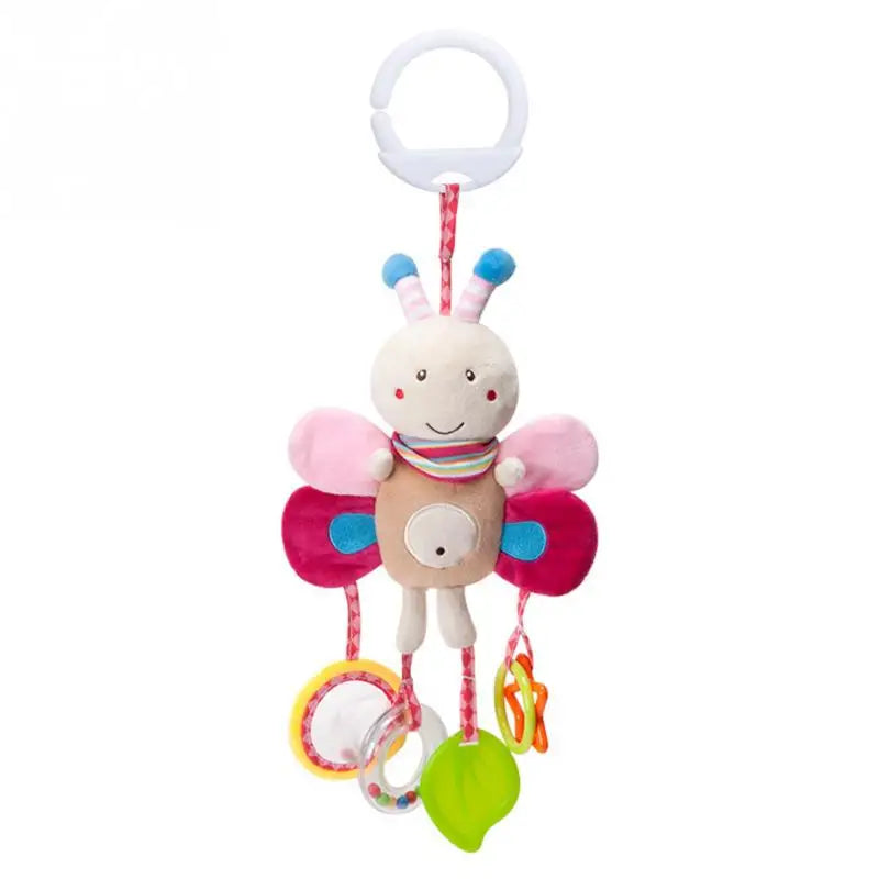 Plush butterfly toy with pink and red wings, a smiling face, blue and pink antennae, and hanging rings and shapes. It features a clip for attachment.