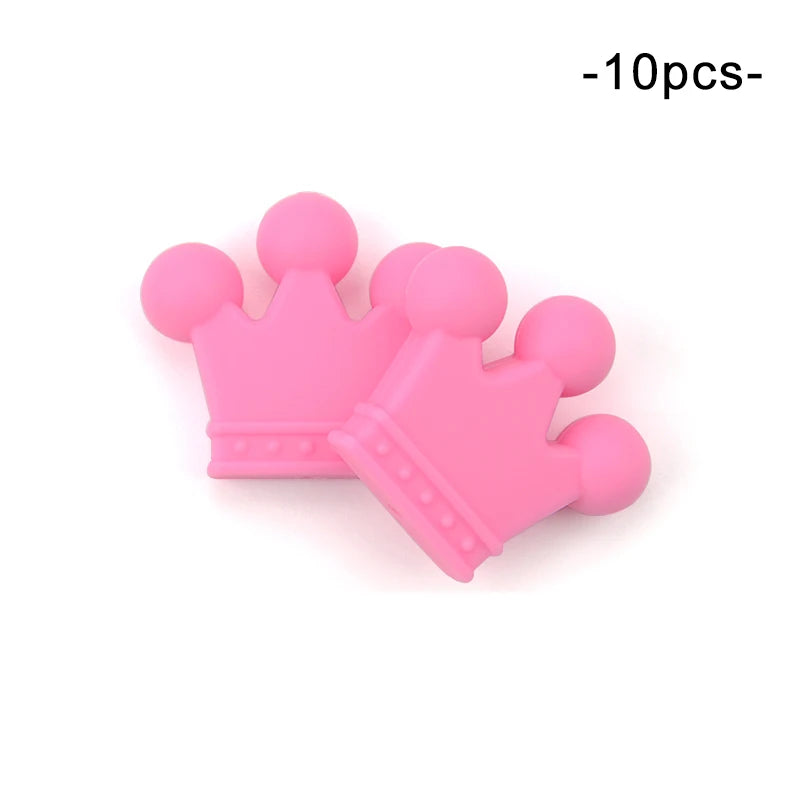 Two pink silicone crown-shaped beads with round tips on a white background. Text reads "-10pcs-".