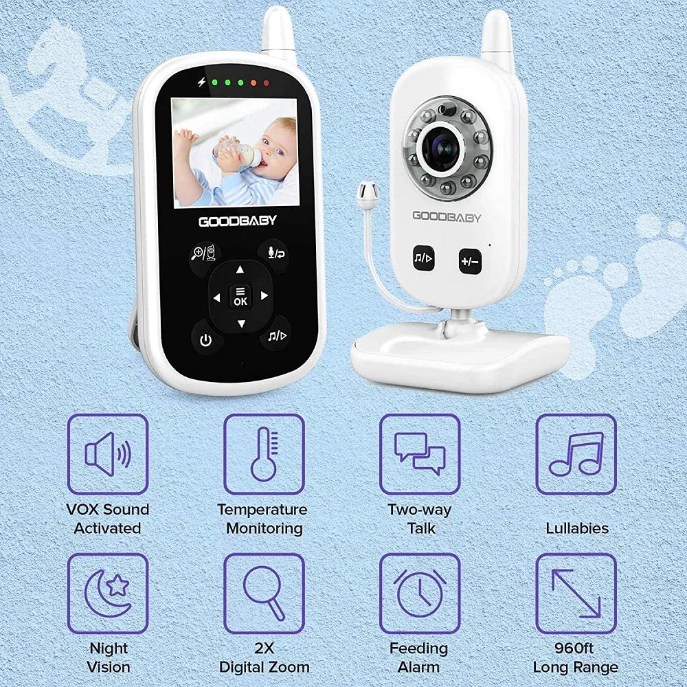 Baby monitor set with camera and handheld screen. Features include VOX sound activation, temperature monitoring, two-way talk, night vision, digital zoom, and a 960ft range.