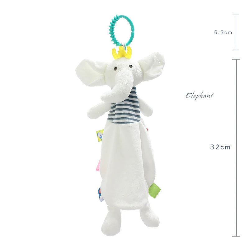 Plush elephant toy with a striped top, yellow crown, and blue ring for hanging. It measures 32cm in length and 6.3cm in width. Colorful tags on its white body.