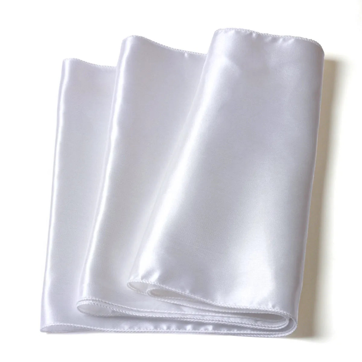 A neatly folded white satin sheet with a smooth, glossy texture, displayed on a white background.