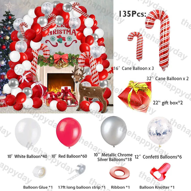Christmas balloon decoration kit with red, white, and silver balloons, candy cane balloons, gift box, ribbon, and a reindeer figure by a decorated fireplace and tree.