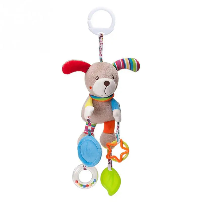 Plush toy dog with colorful ears and scarf, featuring hanging accessories: a star, a green leaf, a clear ring with beads, and a blue circle, all attached to a clip ring.