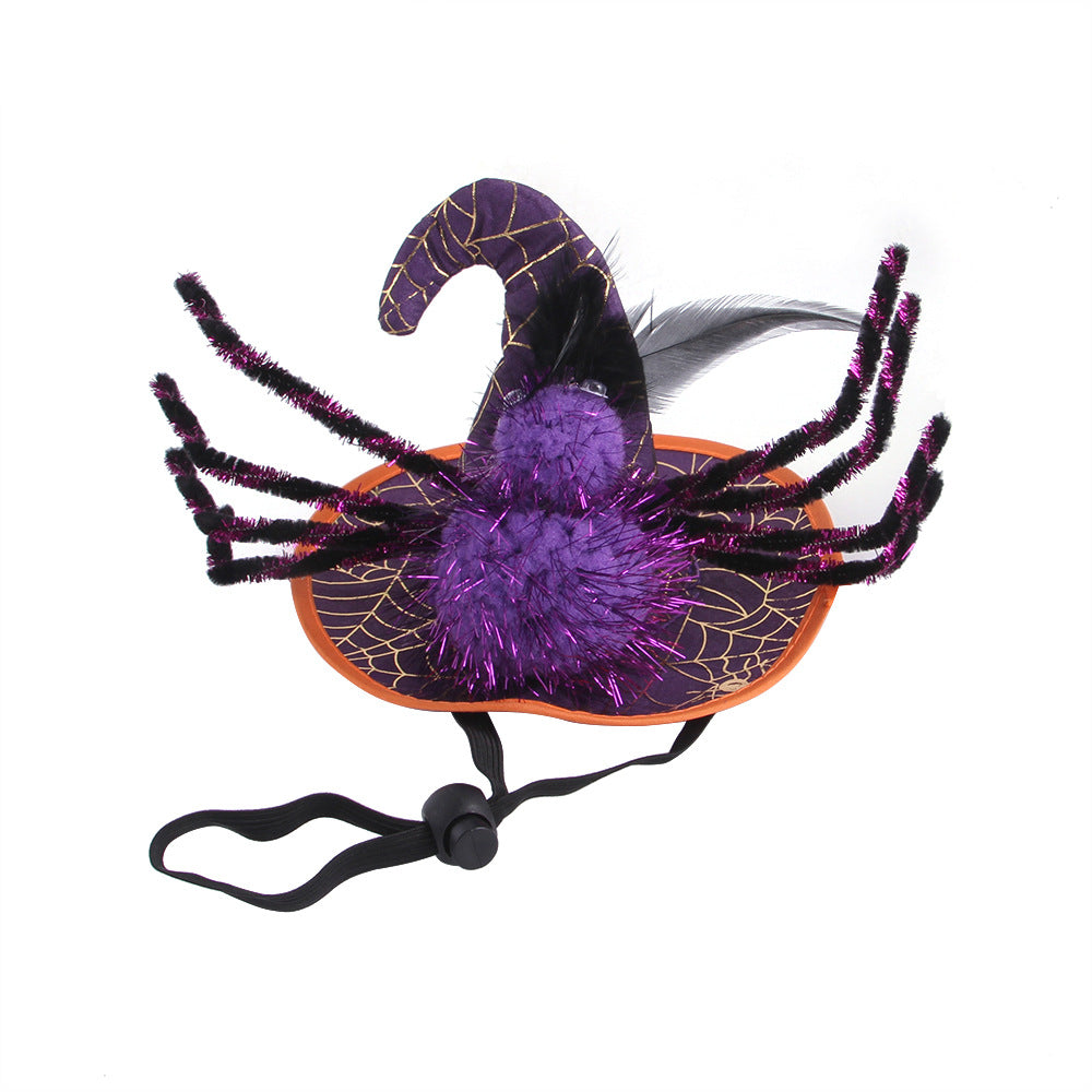 Purple witch hat with spider legs, web pattern, and feathers. Features shimmery accents, orange brim, chin strap. Festive, Halloween headwear for pets or decor.