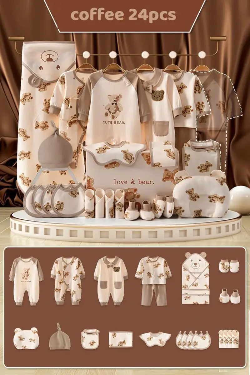 Coffee-themed 24-piece infant clothing and accessory set featuring cute bear designs, including rompers, bibs, hats, and a blanket, all in a soft, neutral color palette.