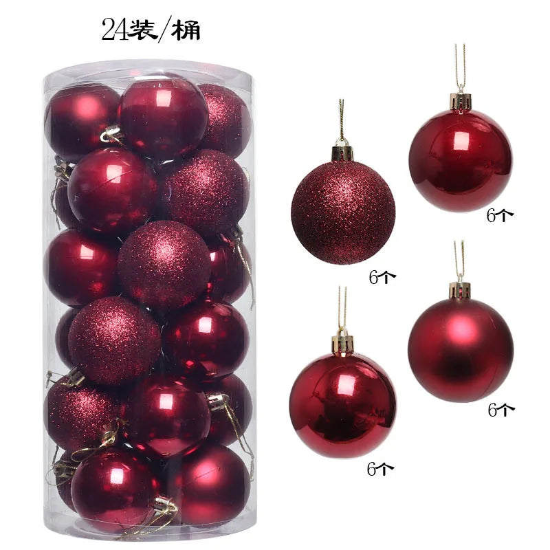 A clear cylindrical container holds 24 red Christmas ornaments, half shiny and half glittery, with individual ornaments displayed beside the container.