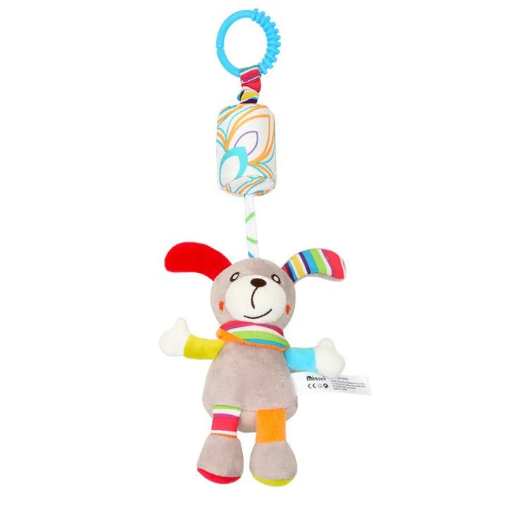 Colorful plush toy bunny with a blue plastic ring for hanging, featuring red and striped ears, a smiling face, and multicolored limbs. Striped neck piece with attached fabric block.