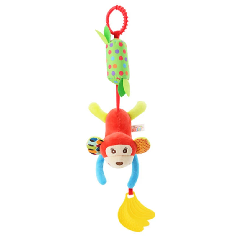 Colorful monkey plush toy with polka-dotted hanging clip, multicolored ears, blue limbs, and yellow banana-shaped teether. It hangs upside down, ideal for babies.