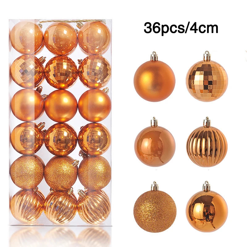Set of 36 shiny, orange Christmas ornaments, each 4cm in size, featuring six different surface textures including smooth, glitter, and ribbed designs, displayed in a clear box.