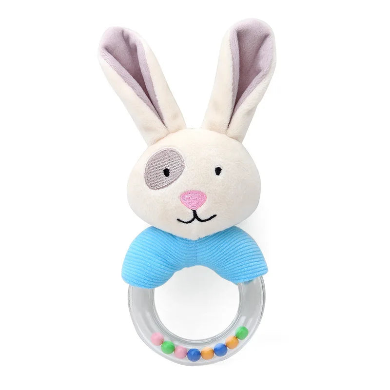 Plush bunny rattle toy with a cream and brown face, pink nose, and long ears. Blue fabric collar attached to a clear ring filled with colorful beads.