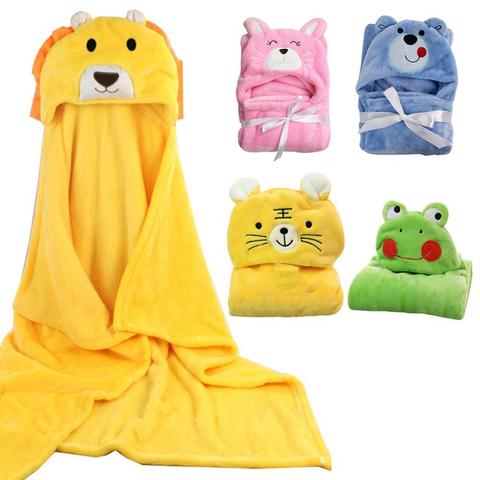 Four colorful hooded baby towels with animal designs: a yellow lion, pink rabbit, blue bear, and green frog. The lion towel is spread open, displaying its full size.