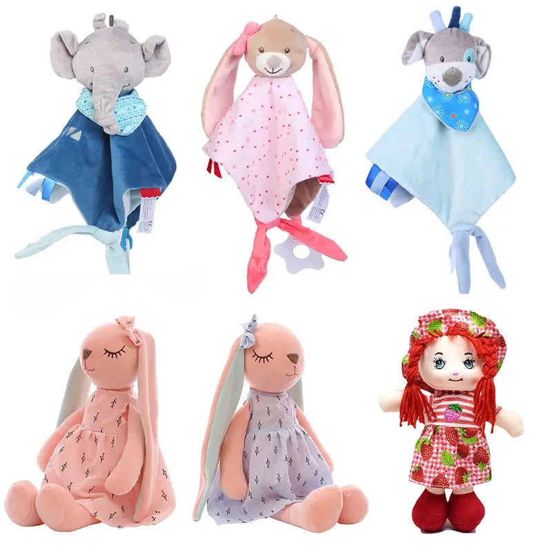 A collection of soft toys: an elephant, bunny, and dog security blankets; two sitting plush bunnies in dresses; and a doll with red hair in a strawberry dress.