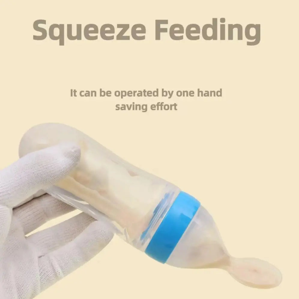 A hand wearing a white glove holds a squeeze feeding bottle with a blue cap and spoon tip. Text above reads: "Squeeze Feeding. It can be operated by one hand saving effort."