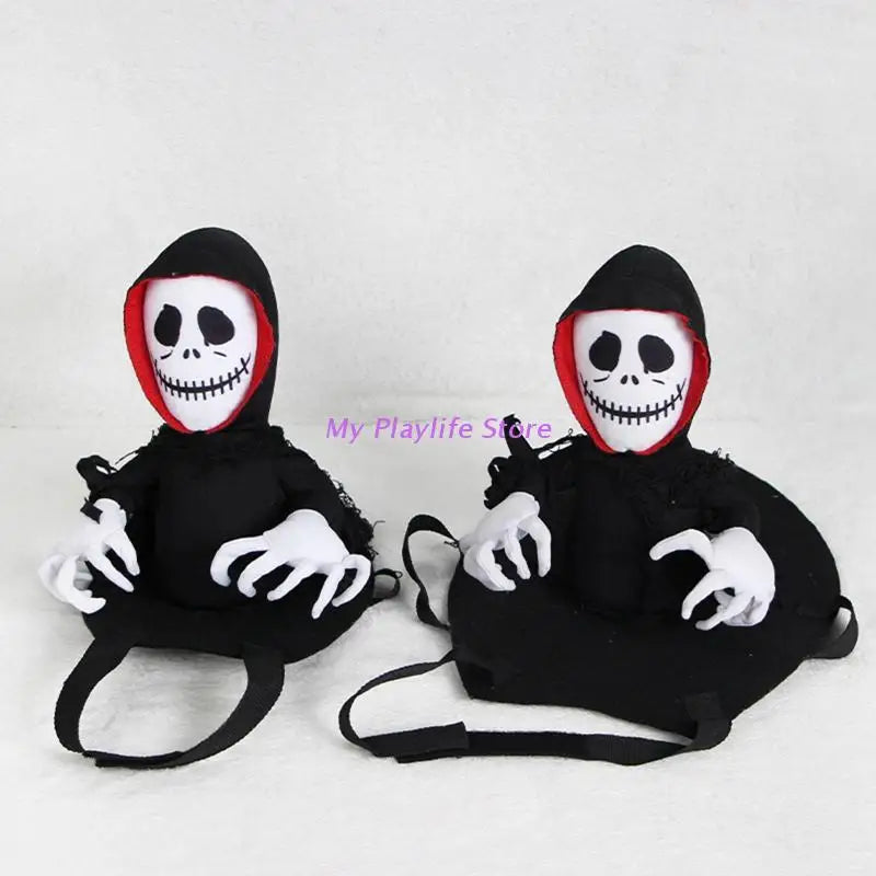 Two plush grim reaper dolls with skeleton faces and black robes. Each has a red-lined hood, white bony hands, and a black base with straps, against a plain background.
