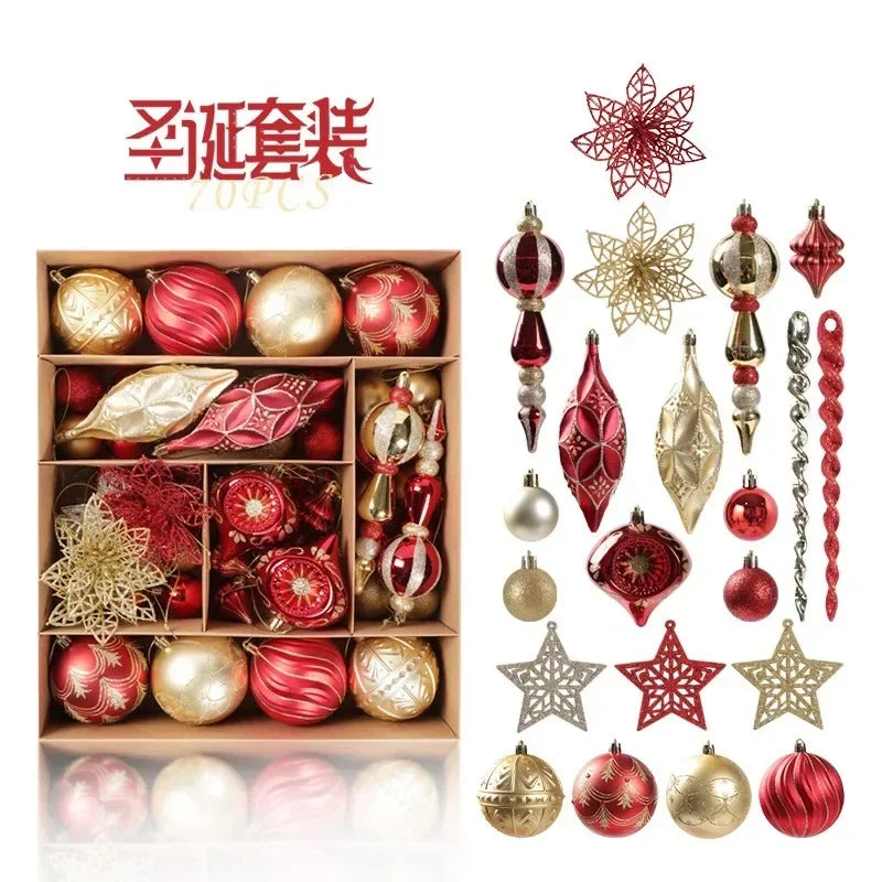 A set of Christmas ornaments including red and gold baubles, stars, and icicles. They are displayed in a box and arranged beside it, featuring intricate designs and glossy finishes.