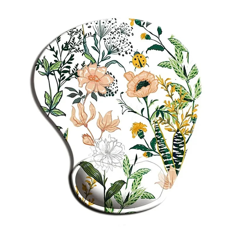 Ergonomic mouse pad with a floral design features colorful flowers, leaves, and a ladybug on a white background, offering a natural, vibrant look.
