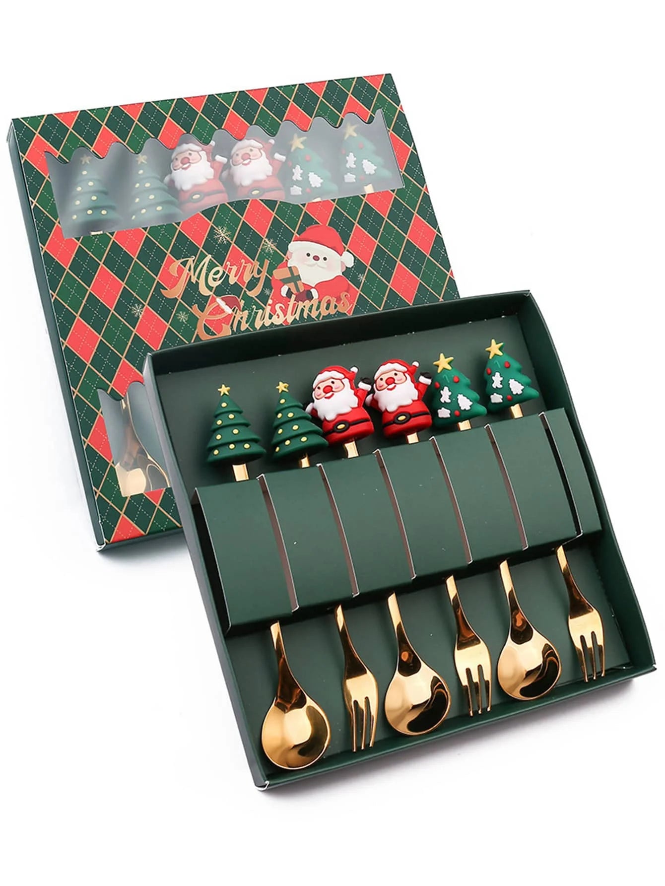 Festive cutlery set features golden forks and spoons with Christmas-themed handles, including Santas and trees, in a green box with a "Merry Christmas" design on the lid.