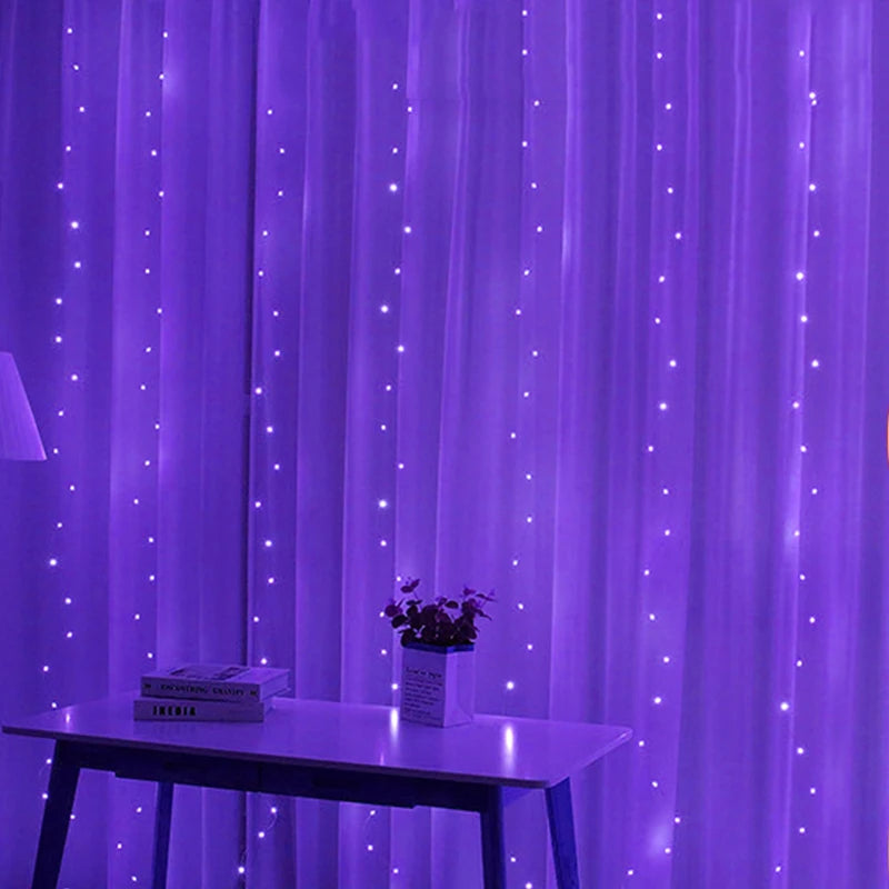 Purple LED curtain lights hang behind a table with a lamp, books, and a potted plant, creating a cozy, ambient glow in the room.
