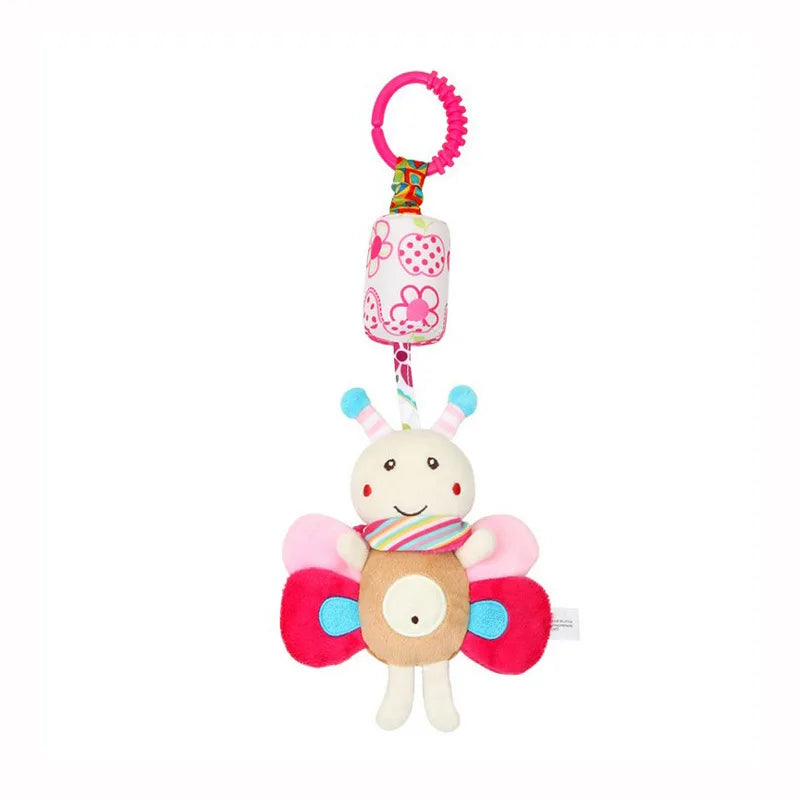 Colorful plush butterfly toy with a smiling face, pink and blue wings, striped scarf, hanging clip, and floral design, ideal for baby play and stroller attachment.